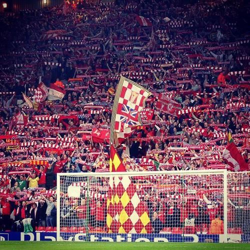 Liverpool fans cheering in the stadium